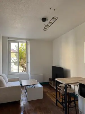Télévision ou salle de divertissement dans l'établissement Bel Appartement T2