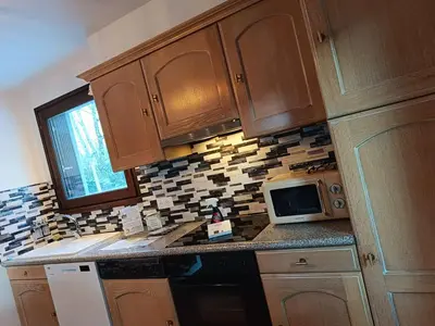 Cuisine ou kitchenette dans l'établissement Rivière et Lodge 4 étoiles - Auvergne - Cantal SU