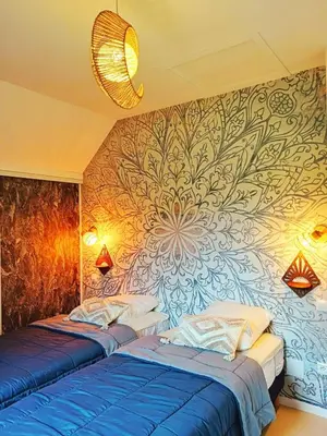 Un ou plusieurs lits dans un hébergement de l'établissement Rivière et Lodge 4 étoiles - Auvergne - Cantal SU