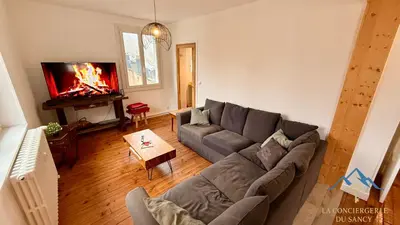 Télévision ou salle de divertissement dans l'établissement Le Mont Dole Duplex 11 pers