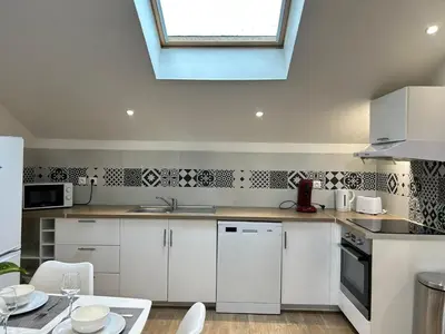 Cuisine ou kitchenette dans l'établissement L'Alphonse, proche de Beaublanc