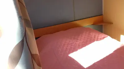 Un ou plusieurs lits dans un hébergement de l'établissement CAMPING de la BUGE