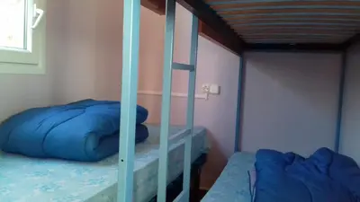 Un ou plusieurs lits dans un hébergement de l'établissement CAMPING de la BUGE