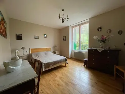 Un ou plusieurs lits dans un hébergement de l'établissement Gîte de caractère au pied du Puy Mary