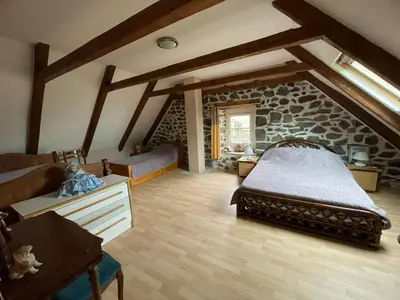 Un ou plusieurs lits dans un hébergement de l'établissement Gîte de caractère au pied du Puy Mary