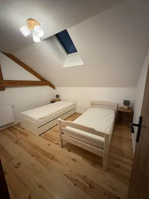 Un ou plusieurs lits dans un hébergement de l'établissement Gîte Les Aubracs - Puy de Dôme - Massif du Sancy