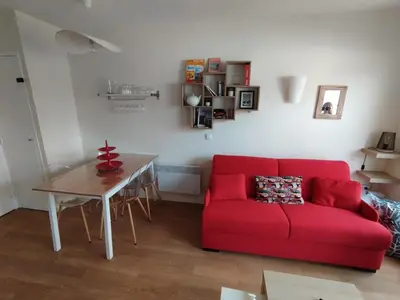 Coin salon dans l'établissement Appartement vue riviere