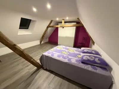 Un ou plusieurs lits dans un hébergement de l'établissement La Maison de Lili - 3 Chambres