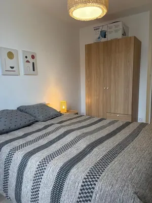 Un ou plusieurs lits dans un hébergement de l'établissement Le Charmant-T2 rénové-Plein centre de Limoges