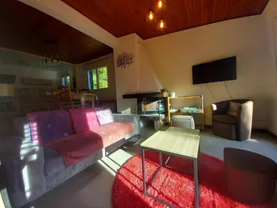 Télévision ou salle de divertissement dans l'établissement chalet vassivière