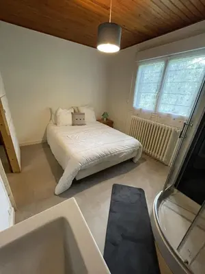 Un ou plusieurs lits dans un hébergement de l'établissement chalet vassivière
