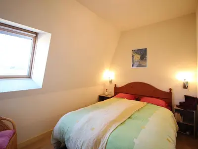 Un ou plusieurs lits dans un hébergement de l'établissement Appartement T2 au centre avec vue, animaux admis, parking - FR-1-608-297