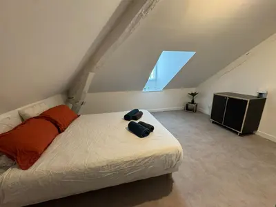 Un ou plusieurs lits dans un hébergement de l'établissement Villa Chadourne - L Amour et le Sablier - 1 Chambre