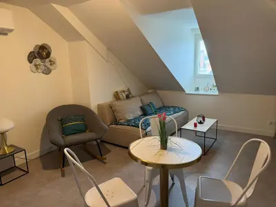 Coin salon dans l'établissement Villa Chadourne - L Amour et le Sablier - 1 Chambre