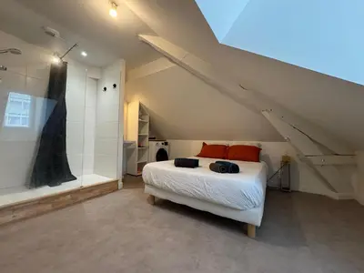 Un ou plusieurs lits dans un hébergement de l'établissement Villa Chadourne - L Amour et le Sablier - 1 Chambre