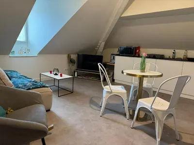 Coin salon dans l'établissement Villa Chadourne - L Amour et le Sablier - 1 Chambre