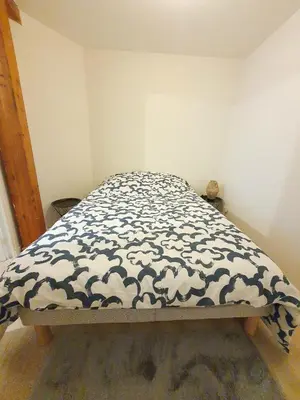 Un ou plusieurs lits dans un hébergement de l'établissement Appartement Saint Martin