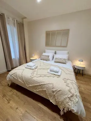 Un ou plusieurs lits dans un hébergement de l'établissement Casa Koenig - T2 spacieux & Terrasse en hyper-centre