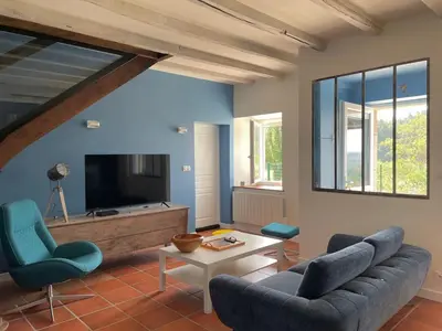 Télévision ou salle de divertissement dans l'établissement Evasion à la campagne