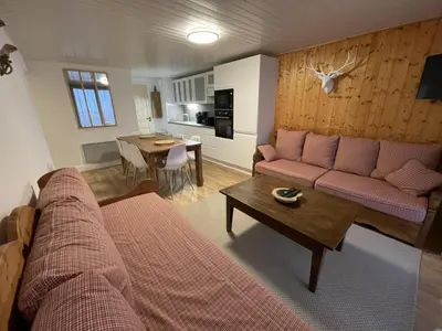 Coin salon dans l'établissement Chaleureux appartement Altitude 1500