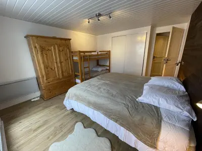 Un ou plusieurs lits dans un hébergement de l'établissement Chaleureux appartement Altitude 1500