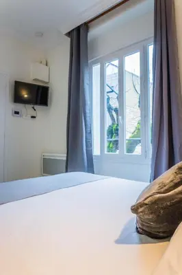 Un ou plusieurs lits dans un hébergement de l'établissement Le Valet - 1 Chambre