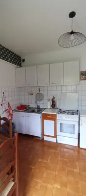Cuisine ou kitchenette dans l'établissement Le rouge-gorge