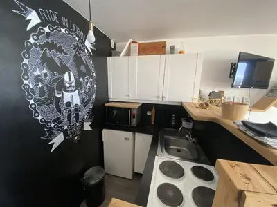 Cuisine ou kitchenette dans l'établissement Superbe studio en coeur de station