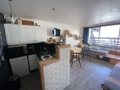 Cuisine ou kitchenette dans l'établissement Superbe studio en coeur de station