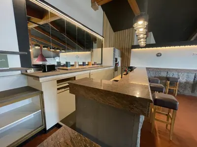 Cuisine ou kitchenette dans l'établissement Exceptionnel Loft