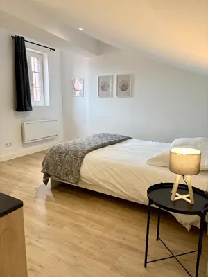 Un ou plusieurs lits dans un hébergement de l'établissement Le Duplex du centre