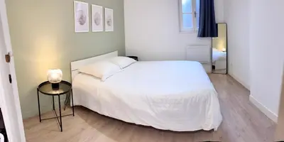 Un ou plusieurs lits dans un hébergement de l'établissement Le Duplex du centre