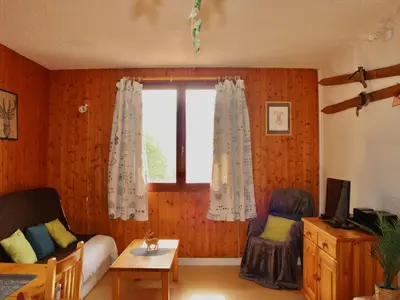Coin salon dans l'établissement Appartement cosy, animaux acceptés, service conciergerie - FR-1-858-2