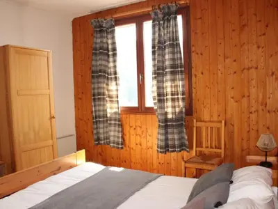 Un ou plusieurs lits dans un hébergement de l'établissement Appartement cosy, animaux acceptés, service conciergerie - FR-1-858-2