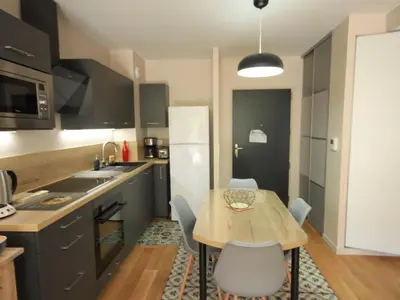 Cuisine ou kitchenette dans l'établissement Charmant appartement scandinave avec parking au Mont-Dore - FR-1-858-1
