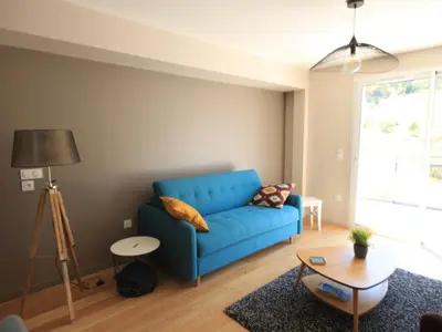 Coin salon dans l'établissement Charmant appartement scandinave avec parking au Mont-Dore - FR-1-858-1