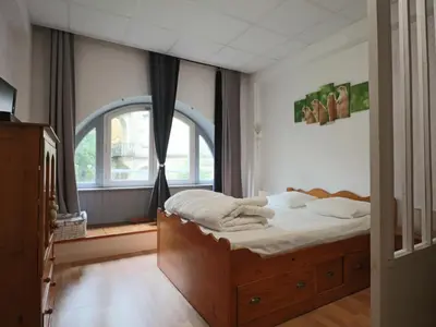 Un ou plusieurs lits dans un hébergement de l'établissement Duplex historique 4 personnes à La Bourboule - FR-1-858-3