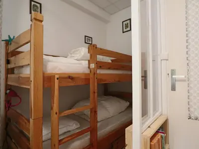 Un ou plusieurs lits dans un hébergement de l'établissement Duplex historique 4 personnes à La Bourboule - FR-1-858-3
