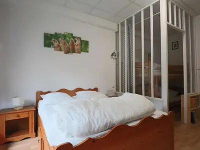 Un ou plusieurs lits dans un hébergement de l'établissement Duplex historique 4 personnes à La Bourboule - FR-1-858-3
