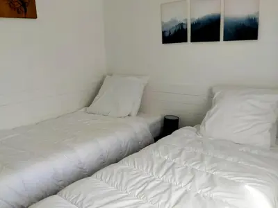Un ou plusieurs lits dans un hébergement de l'établissement L'R du Roc : Appartement Duplex 4* avec Terrasse et Garage - FR-1-858-7