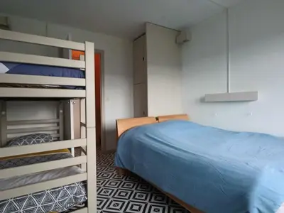 Un ou plusieurs lits dans un hébergement de l'établissement Charmant Duplex 4 Pers. avec Parking Privé à Murat-le-Quaire - FR-1-858-9