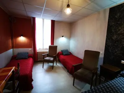 Coin salon dans l'établissement Appartement 4 pers, 1er étage, Wi-Fi, La Bourboule - FR-1-858-16