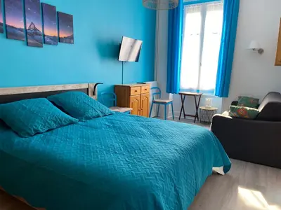 Un ou plusieurs lits dans un hébergement de l'établissement Appartement 6 personnes au cœur de La Bourboule - FR-1-858-23