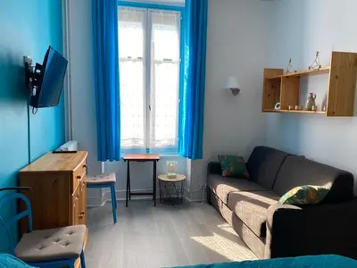 Télévision ou salle de divertissement dans l'établissement Appartement 6 personnes au cœur de La Bourboule - FR-1-858-23