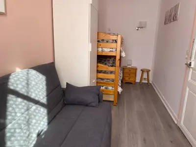 Coin salon dans l'établissement Appartement 6 personnes au cœur de La Bourboule - FR-1-858-23