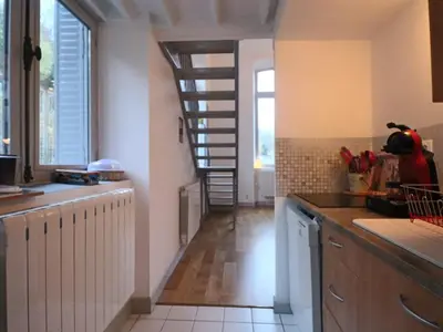 Cuisine ou kitchenette dans l'établissement Loft lumineux en centre-ville, proche thermes, pour 4 personnes - FR-1-858-28