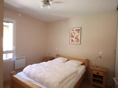 Un ou plusieurs lits dans un hébergement de l'établissement Chalet Montagne avec Terrasse et Parking - FR-1-858-29