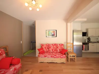 Coin salon dans l'établissement Chalet Montagne avec Terrasse et Parking - FR-1-858-29