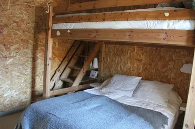 Un ou plusieurs lits dans un hébergement de l'établissement Chouette Bourboule 2 chambres, 6 pers, terrasse