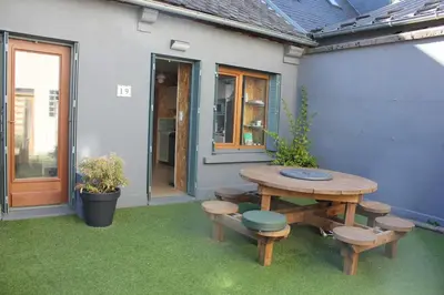 Jardin de l'établissement Chouette Bourboule 2 chambres, 6 pers, terrasse
